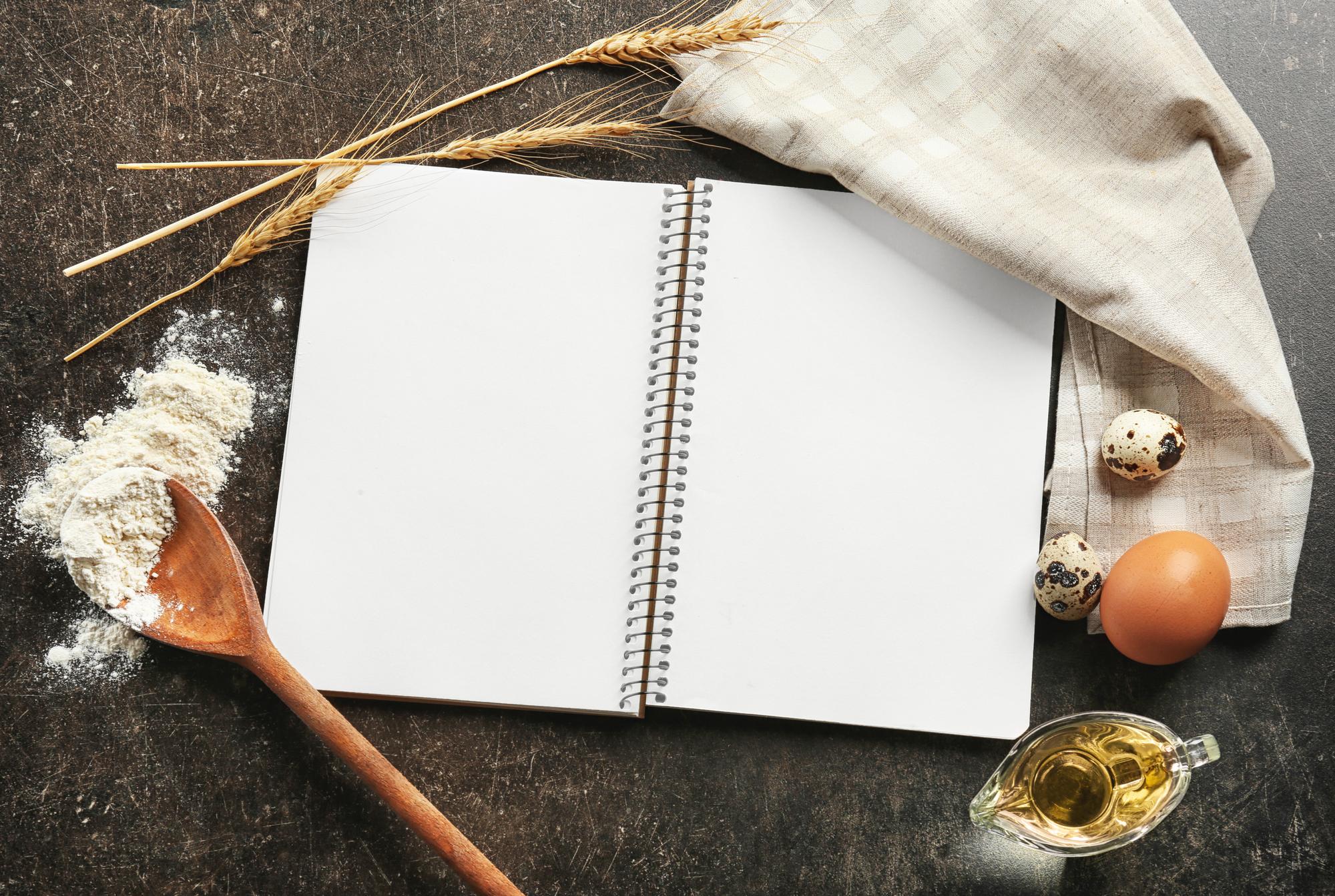 stack of recipe booklets and notes